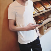 Camisa ajustada de cuello redondo y media manga