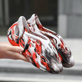 Sandálias masculinas coreanas camufladas com buracos de coco Baotou Hollow Sandálias de praia de tamanho grande