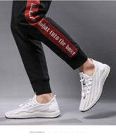 Par de tênis de corrida com sola macia e respirável