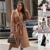 Fashionable women’s wool coat with long sleeves and a belted wrap design. Elegant and versatile — perfect for spring and autumn.