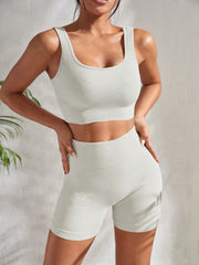 2-piece women's workout set – ribbed crop top and high-waist shorts.