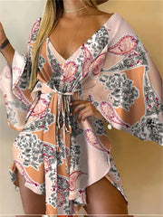 Boho Floral Mini Dress – Sexy V-Neck, Bat Sleeves & Flowy Fit for a Relaxed Summer Look.