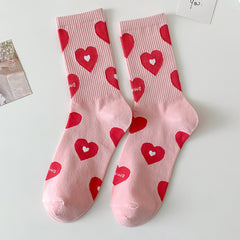 Calcetines nuevos con corazones y fresas para niña