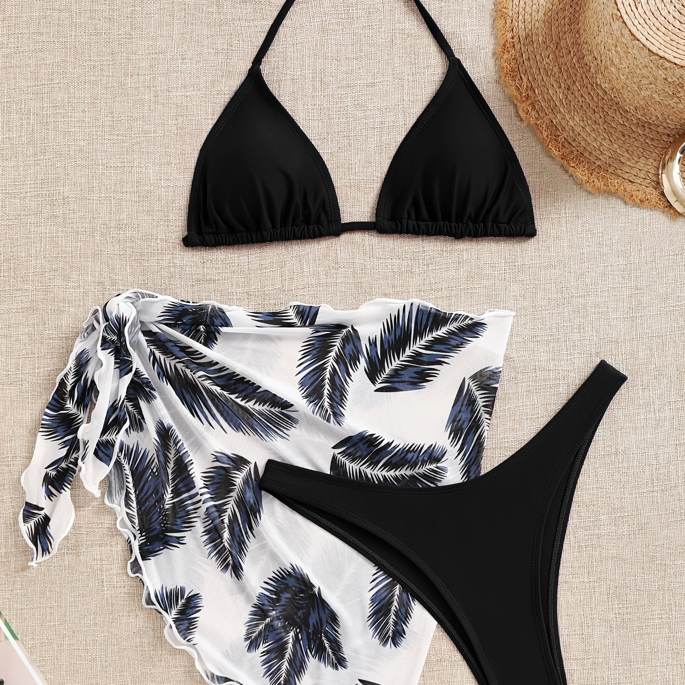 Sexy bikini set with stylish beach cover-up skirt – trendy 3-piece design, perfect for beach vacations and summer days.