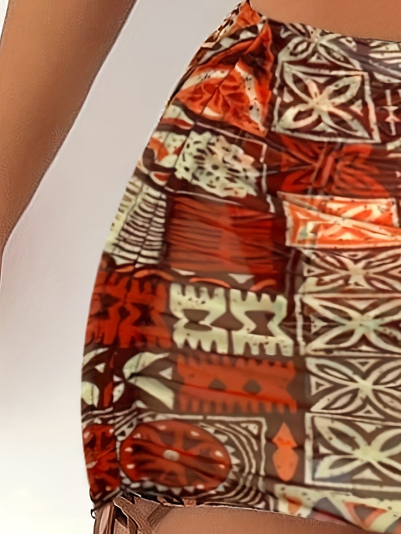 2025 women’s geometric bikini set with halter top, tie detail, and matching headscarf.