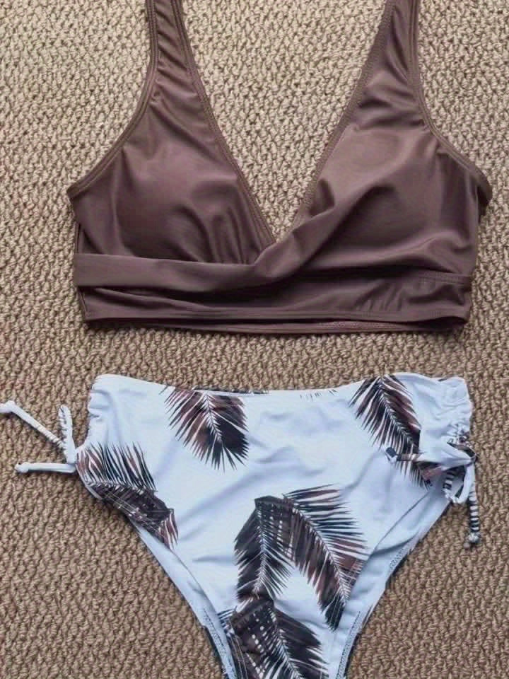 Leaf print color-block bikini set with tie-front top and side-cut bottom.