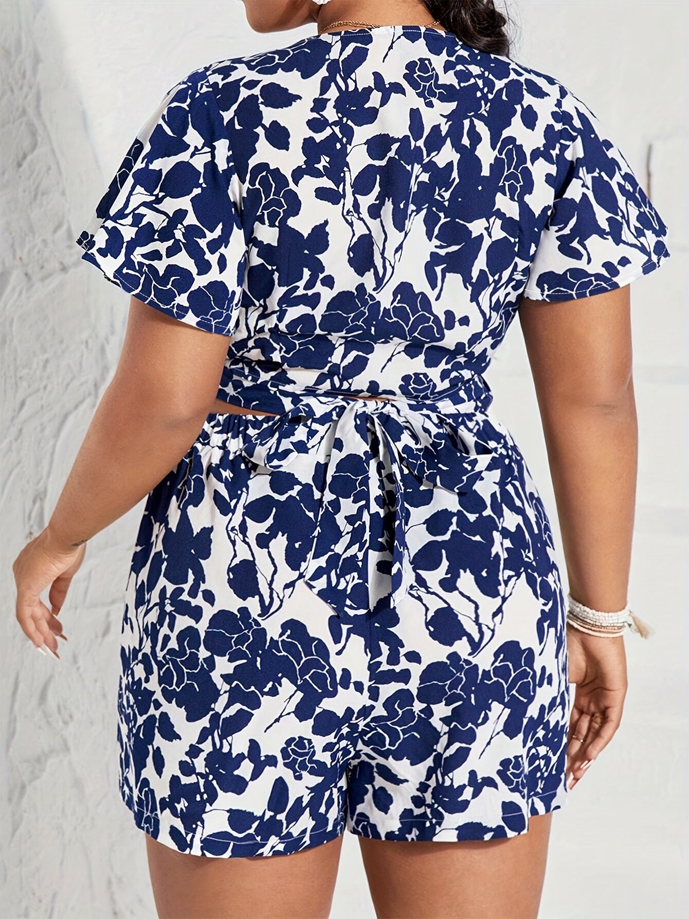 Boho Chic Set – Deep V-Neck Crop Top & Floral Shorts with Belted Waist, Perfect for Summer Getaways
