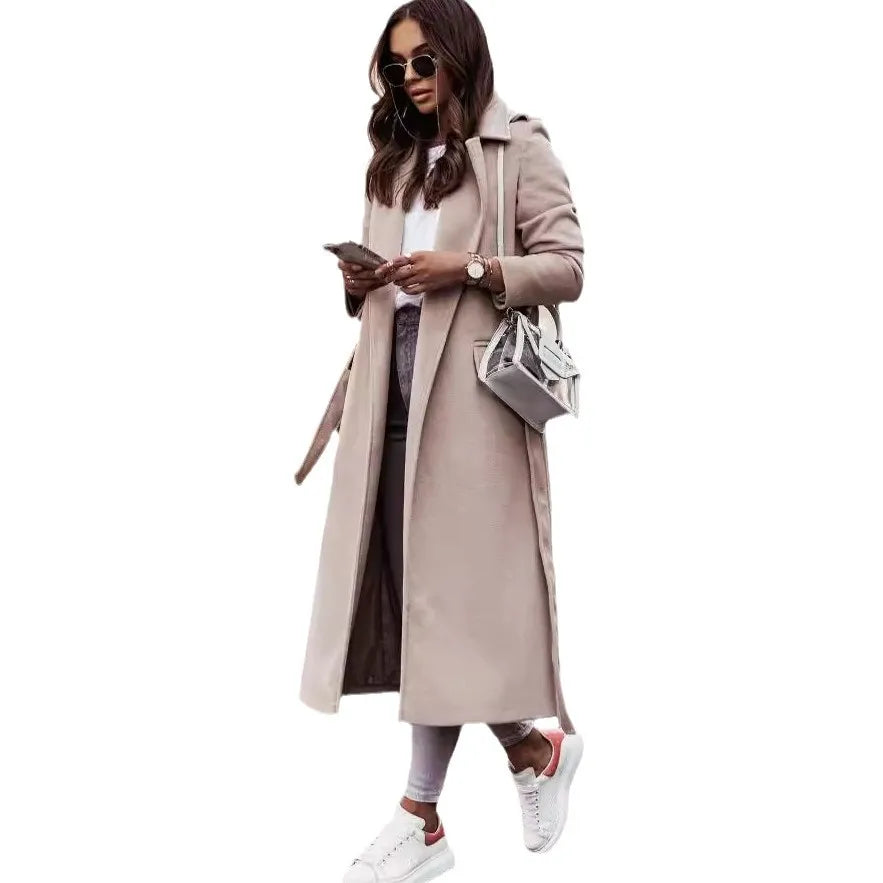 Fashionable women’s wool coat with long sleeves and a belted wrap design. Elegant and versatile — perfect for spring and autumn.