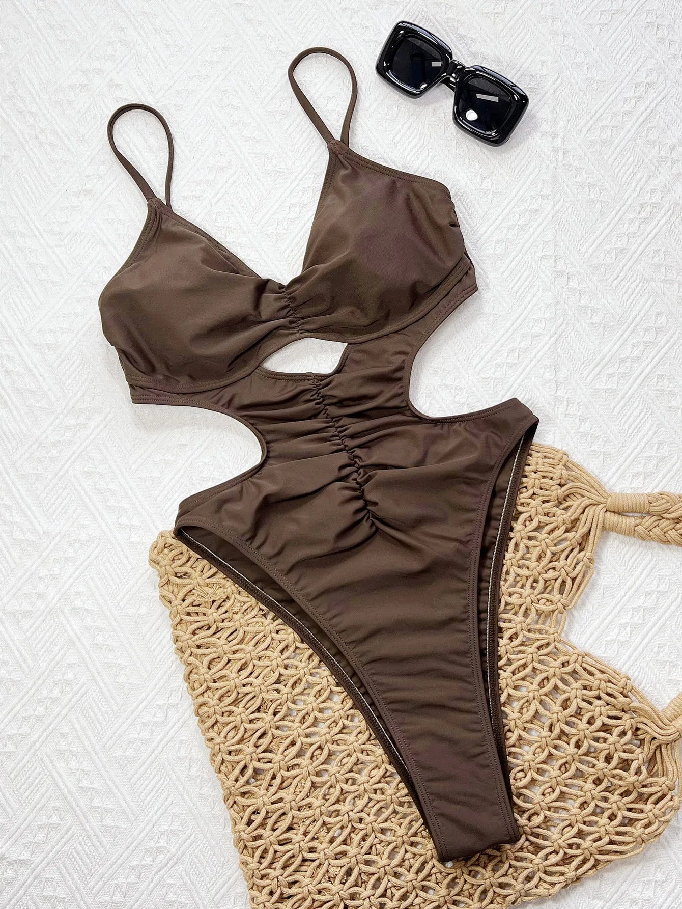 Sexy Backless One-Piece — Solid, Pleated, Hollow-Out Design. High-Leg Cut, Padded for Comfort.