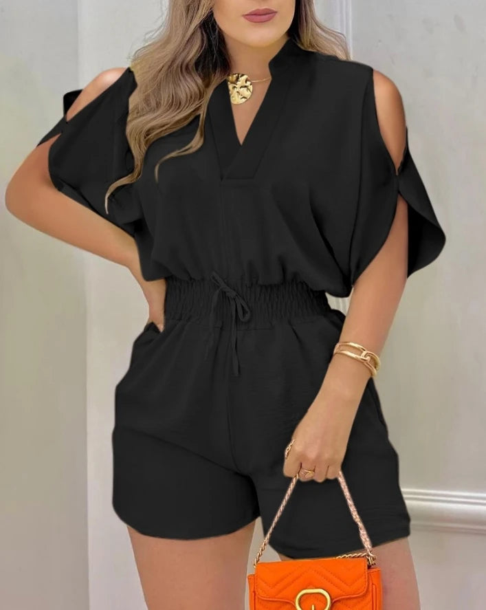 Summer 2025 elegance: cold-shoulder jumpsuit with a high waist.