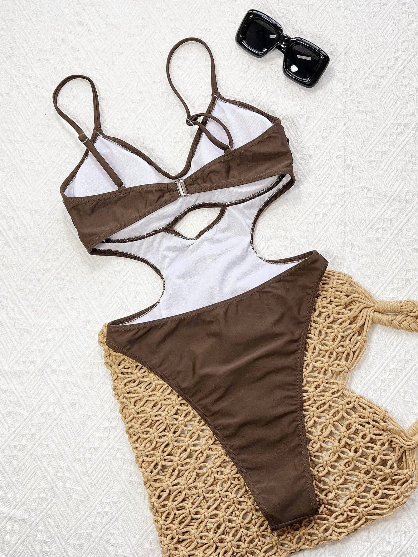 Sexy Backless One-Piece — Solid, Pleated, Hollow-Out Design. High-Leg Cut, Padded for Comfort.