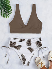 Leaf print color-block bikini set with tie-front top and side-cut bottom.