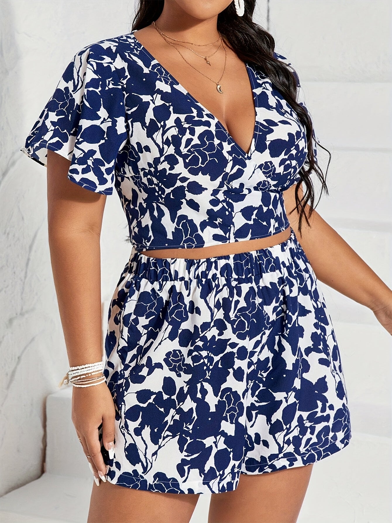 Boho Chic Set – Deep V-Neck Crop Top & Floral Shorts with Belted Waist, Perfect for Summer Getaways