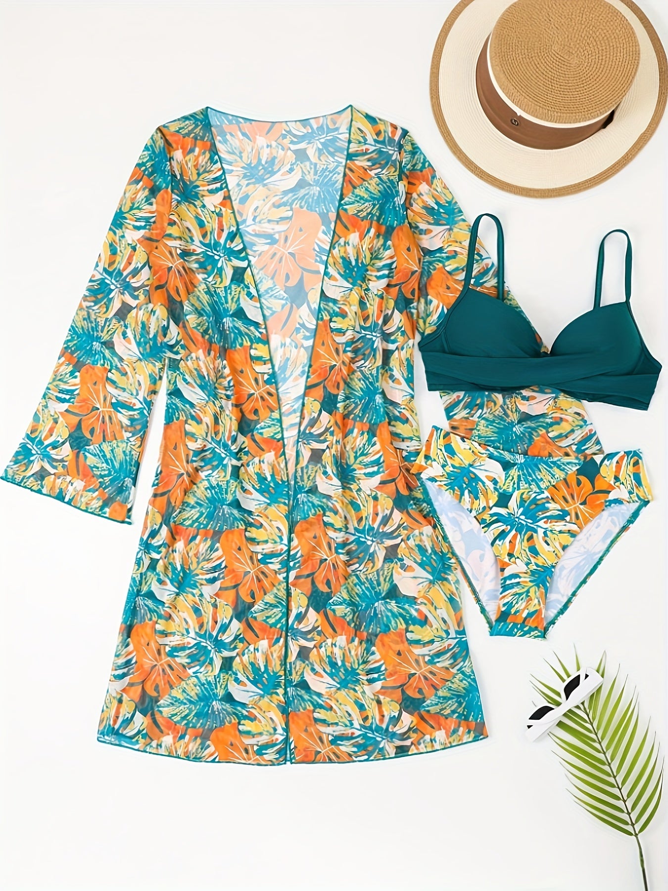 3-Piece Tropical Print Swimsuit Set – high-stretch ribbed fabric, cross spaghetti strap detail. Perfect for summer and beachwear.